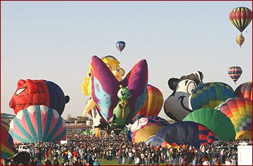 New mexico Wine & Scenic Tours has outings to all kinds of events including balloon fiesta, seen here, and can plan outings and day trips around your particular tastes.
